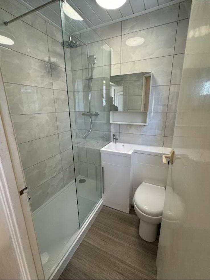 Bathroom installation completed for a Bedford homeowner